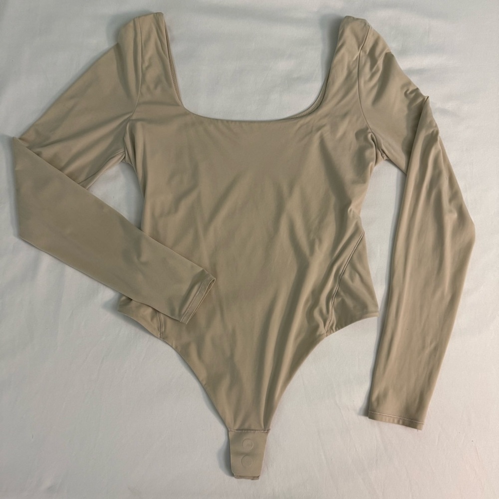 Lululemon Athletica Cream Long Sleeve Bodysuit
